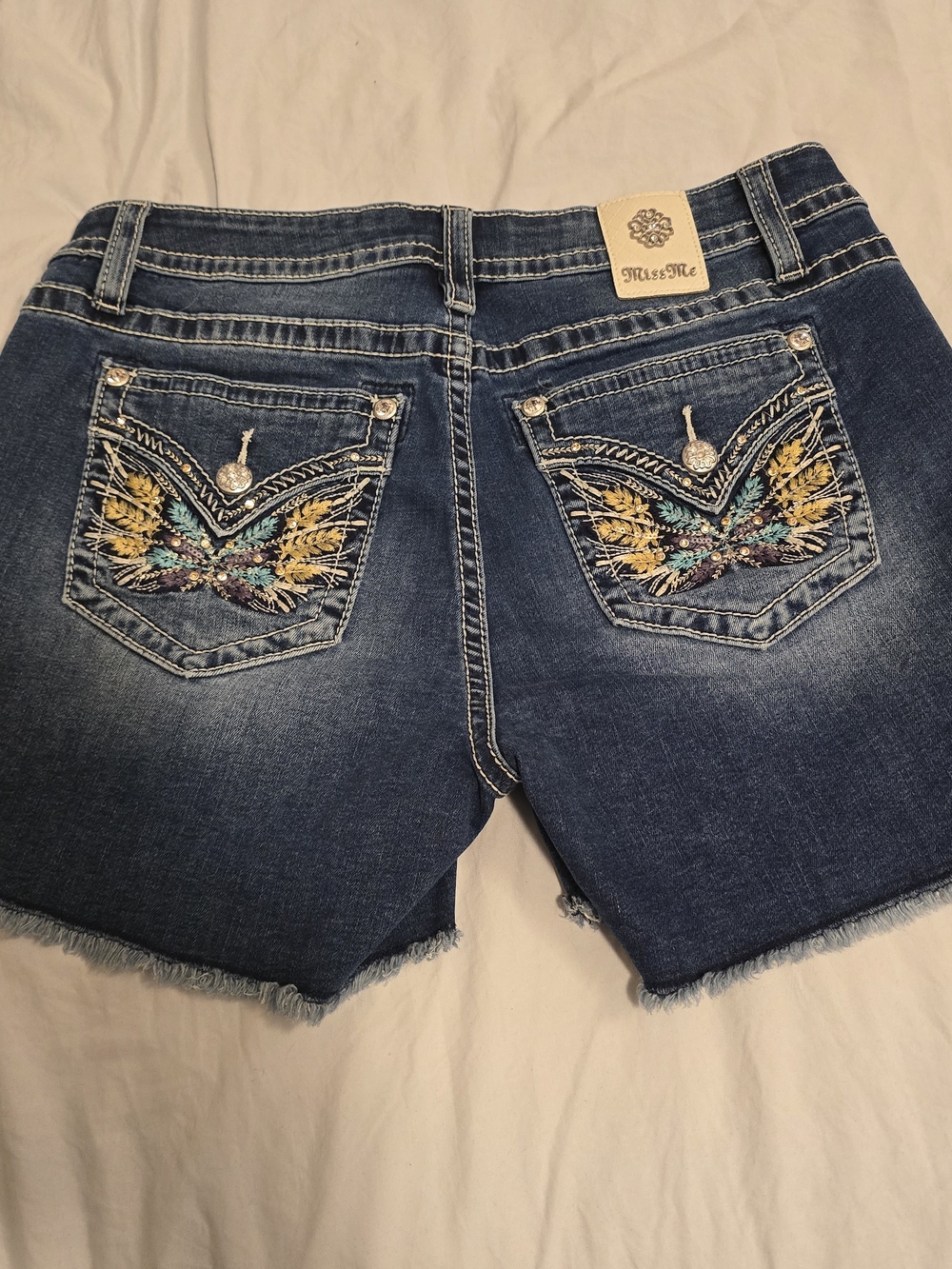 Miss Me Embroidered Denim Cutoff Shorts - Blue with Yellow & Teal Accents